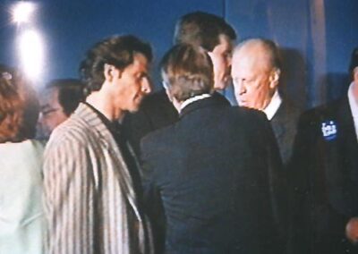 Advising President Gerald Ford after emceeing post-Presidential debate, October 1996. (Lorenzo Lamas and Bob Dole in the foreground.)