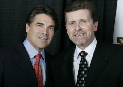 With Texas Governor Rick Perry after emceeing an event where he was featured speaker, late 2008.