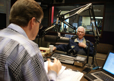 IN-STUDIO WITH CAPT. GENE CERNAN, September 2012: Interviewing on radio while British film crew captures it all as part of their upcoming documentary on "The Last Man on the Moon".