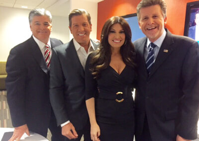 At FOX NEWS NEW YORK CITY: With our friend Kimberly Guilfoyle ...as we are elegantly photobombed by Sean Hannity and Eric Bolling....December 2015.