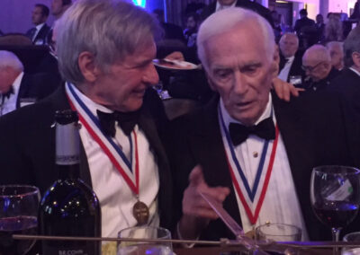 My view (and photo) across the dinner table at the same event as Harrison Ford talked with Gene Cernan about the legendary astronaut's new film, "The Last Man on the Moon".