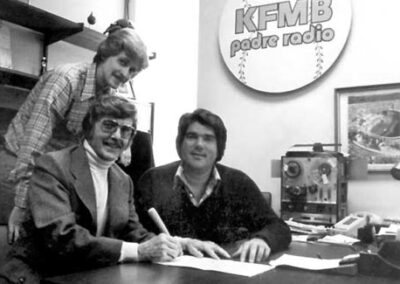 More "guys with large hair" signing a new contract with radio veteran Bill Ballance and Paul Palmer. (Late 1970's)