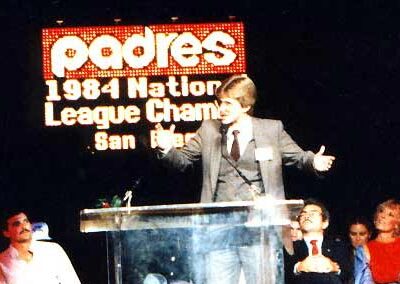 In front of 50,000 Padres fans after Padres Pennant win, San Diego Stadium, 1984. (Nice vest, eh?)