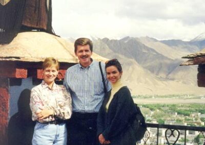 On the roof of the Potala Palace in Tibet with Linda Reynolds and Darla Hancock, members of the delegation.