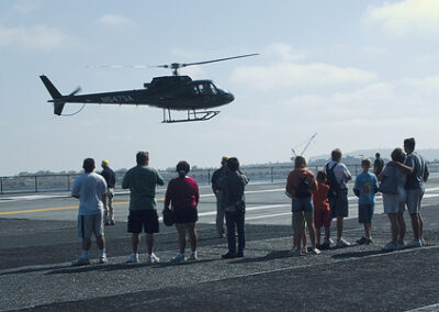 What a way to make an entrance! Larson flies onto the deck of the USS Midway Aircraft Museum (well, RIDING, not flying... Ivor from Corporate Helicopters did that)... along with Rep. Darrell Issa and U.S. Senate candidate Bill Jones.