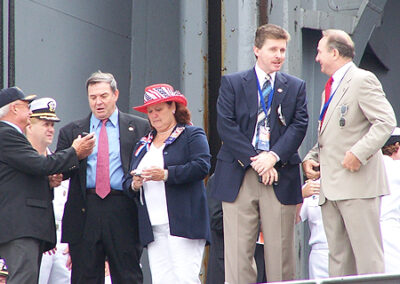 The scene on the USS Ronald Reagan shortly before Homeporting ceremonies began, July 23, 2004. Also shown are Rep. Duncan Hunter, Chairman of the U.S. House Armed Services Committee and his wife Lynn.