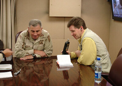 With Commanding General John Abizaid, on location in the Middle East, September 2005.